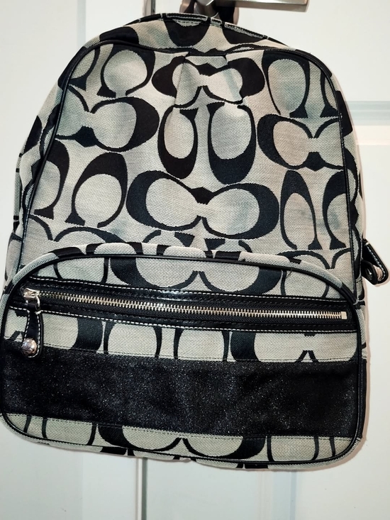 coach backpack black and white West In Signature Canvas Crafted of refined pebble leather and smooth calf leather Sprint Backpack